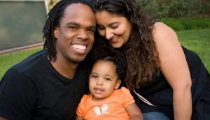 Family with small child smiling