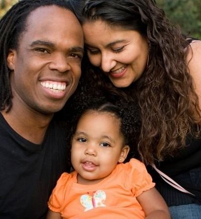 Family with small child smiling